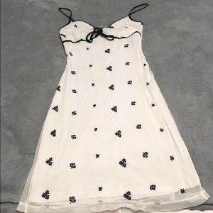 XOXO Dresses - Below knee dress white dress sigh black flowers XOXO Dresses - Below knee dress white dress sigh black flowers